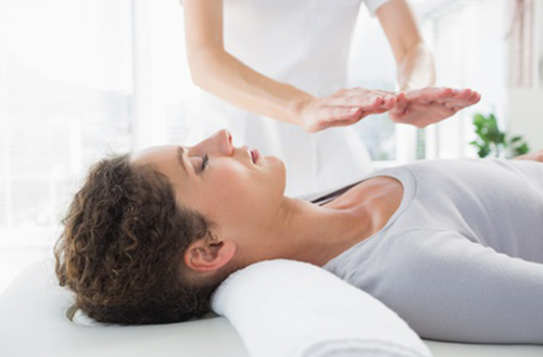 Woman having Reiki treatment in Kelowna, Canada